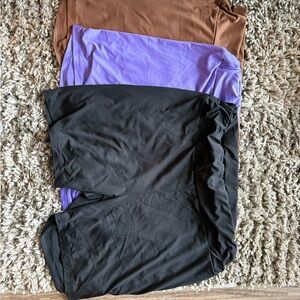 Set of Three Shorts in Black, Purple, and Brown